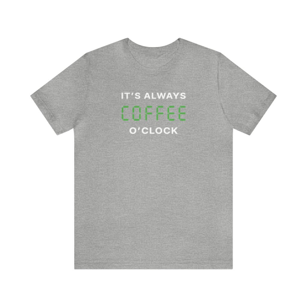 A gray Funny T-Shirt saying "It's always coffee o'clock" in letters looking like digits on a digital clock.