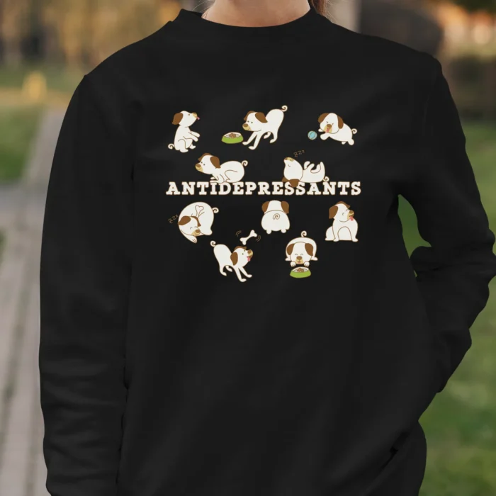 A funny black Sweatshirt for dog lovers with cartoony pictures of funny dogs saying "Antidepressants".