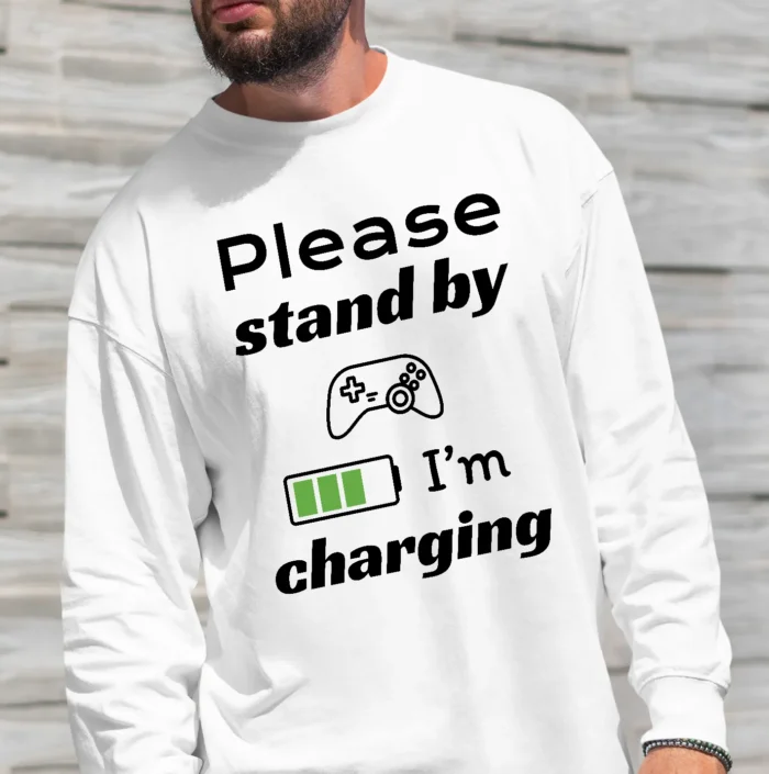 Funny Sweatshirt for Gamers featuring a picture of a gamepad and saying "Please stand by, I'm charging". White color