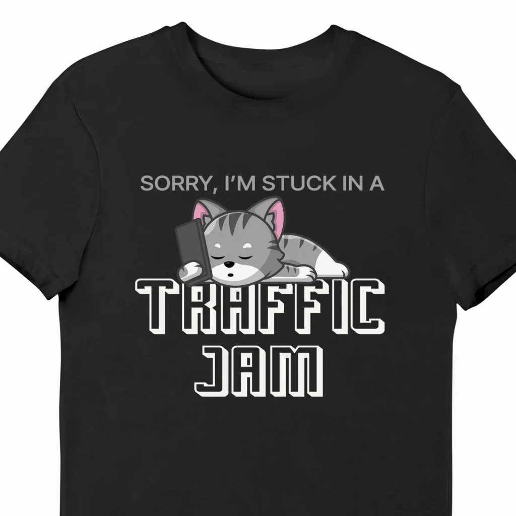 A funny t-shirt with a cute cat sleeping, it says "Sorry, I'm stuck in a traffic jam" black color