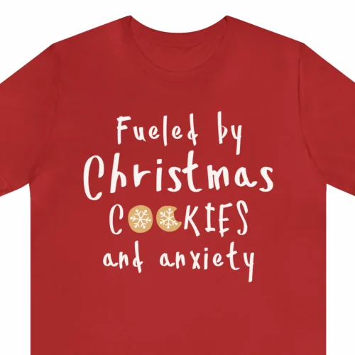 A Funny Christmas t-shirt with cookies, the t-shirt says "Fueled by Christmas cookies and anxiety", red color