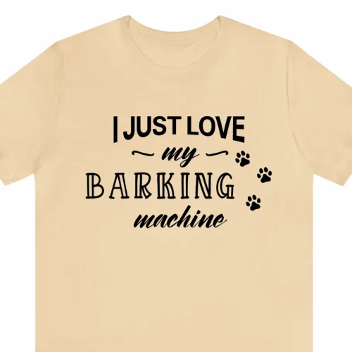 A funny t-shirt for dog lovers saying "I just love my barking machine", sand color