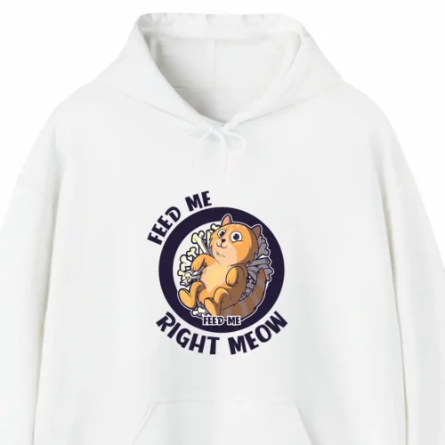 A funny hoodie with a picture of a cute cartoony cat saying "Feed me. Feed me right meow", white color