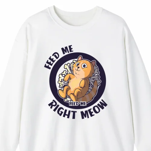 A funny sweatshirt with a picture of a cute cartoony cat saying "Feed me. Feed me right meow", white color