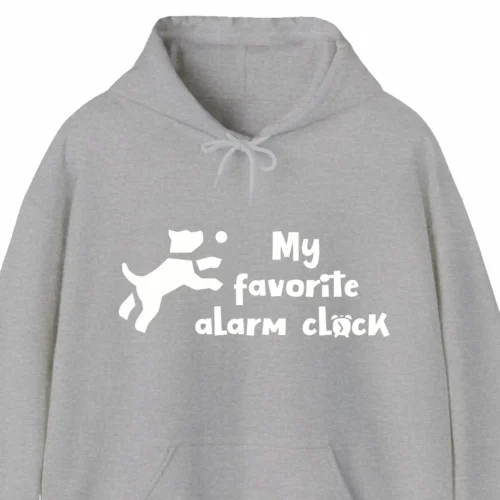 A funny hoodie with a picture of a cute cartoony dog saying "My favorite alarm clock", gray color